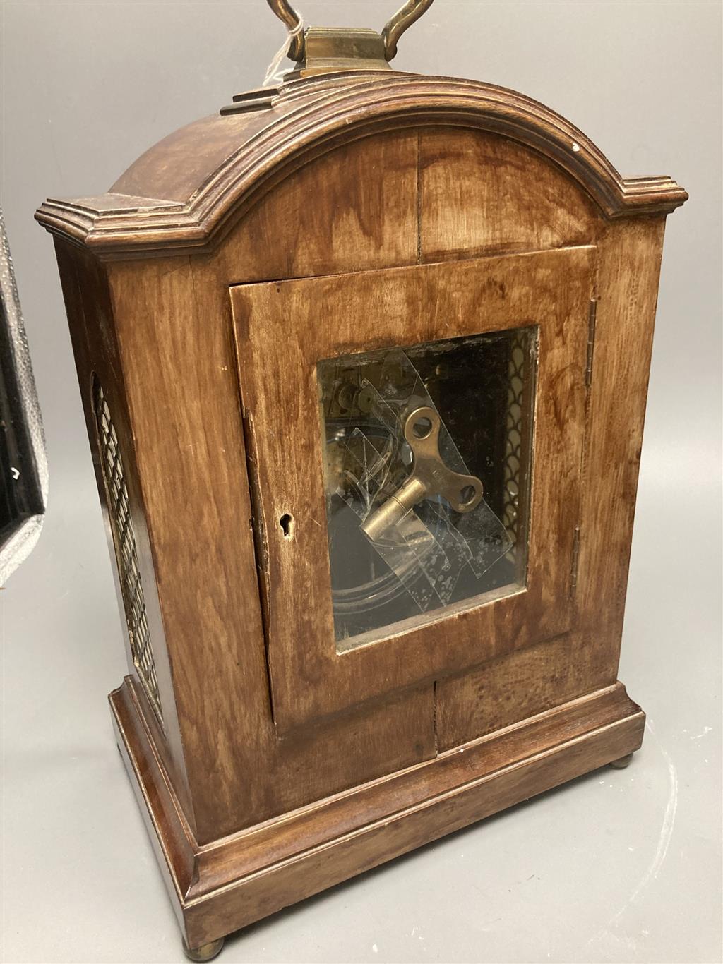 A German 19th century chiming bracket clock, in George III style, with brass grills, height 40cm